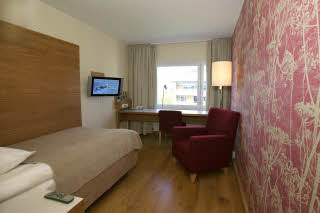 Single room with red floor